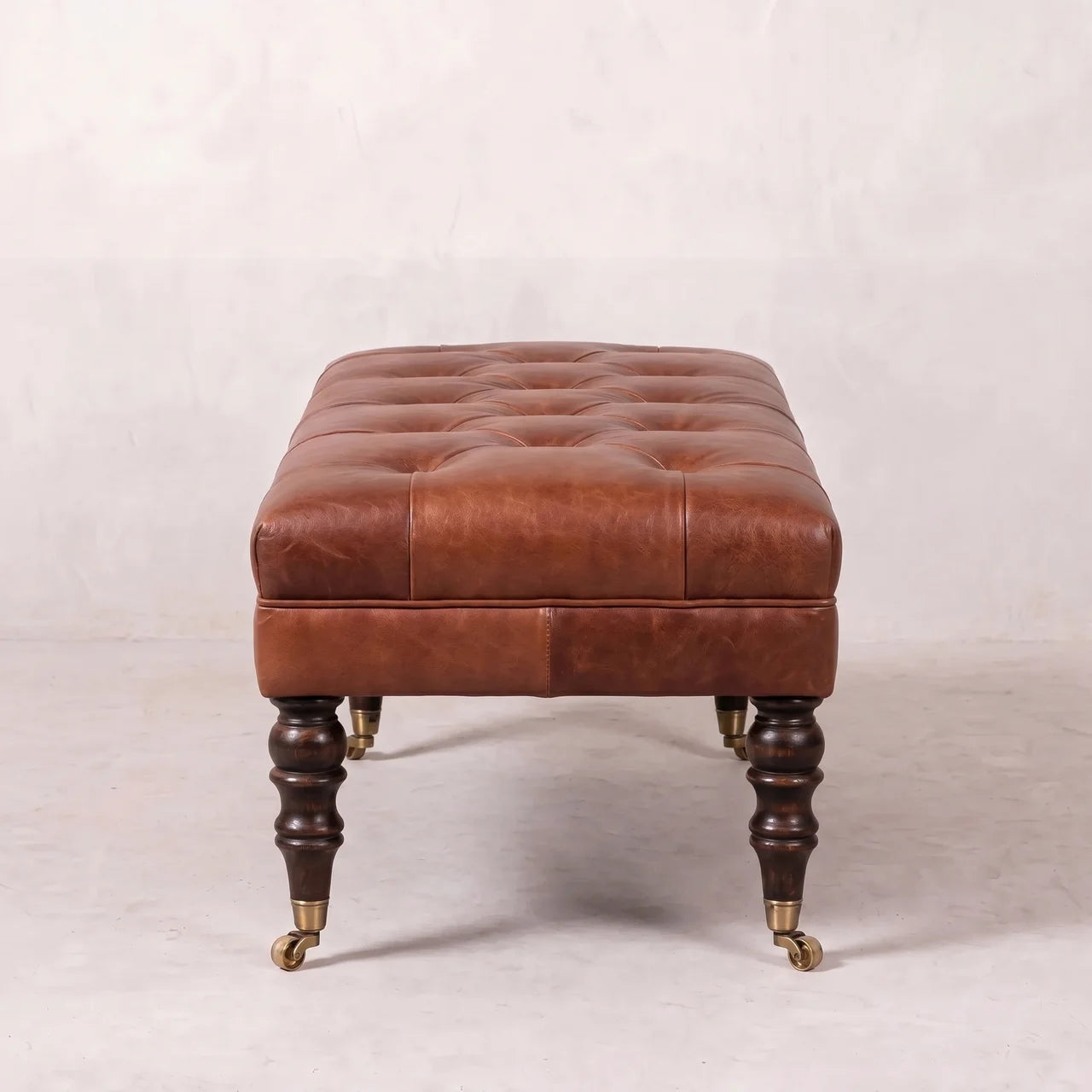Buffalo Brown Leather Ottoman with Castor Legs
