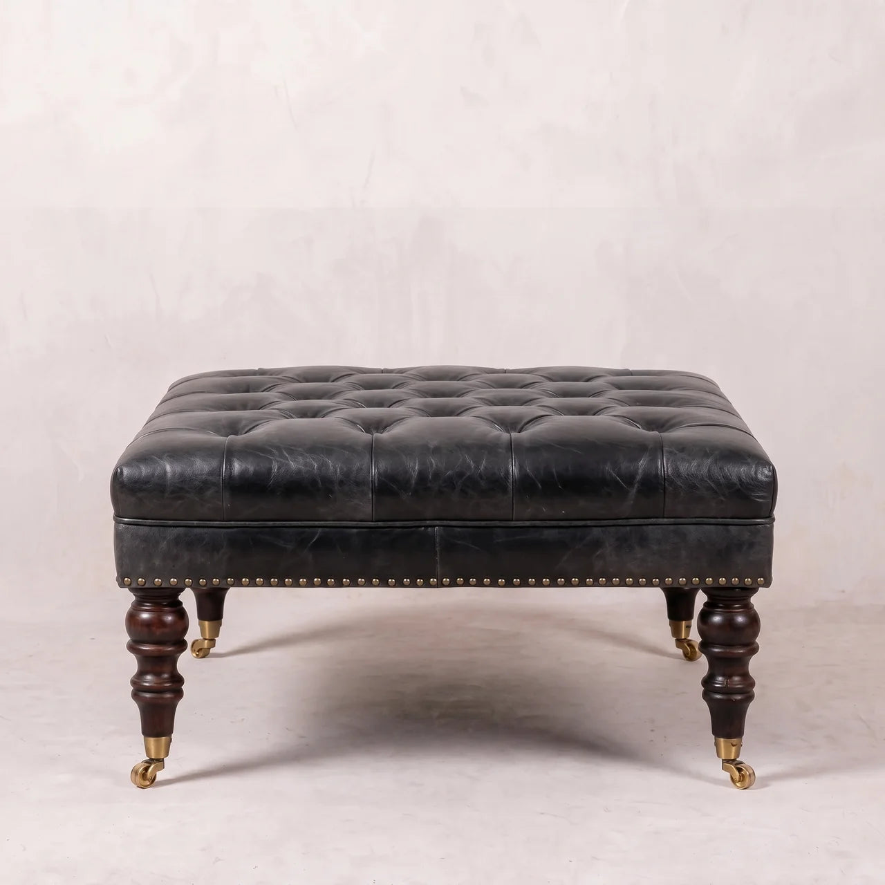 Black Leather Upholstered Ottoman